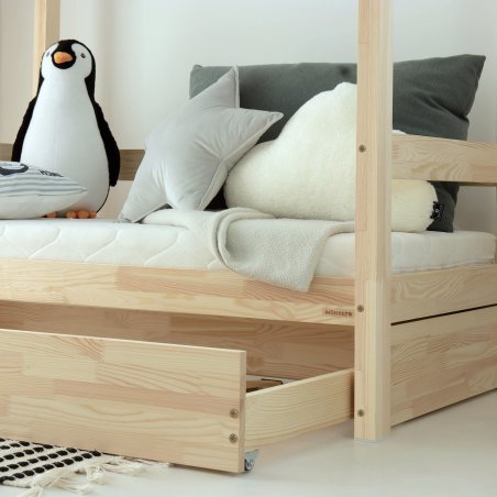 Geöffnete Schublade des TUULA MODERN Bettes mit seitlichen Abdeckleisten Geöffnete Schublade des TUULA MODERN Bettes mit seitlichen Abdeckleisten